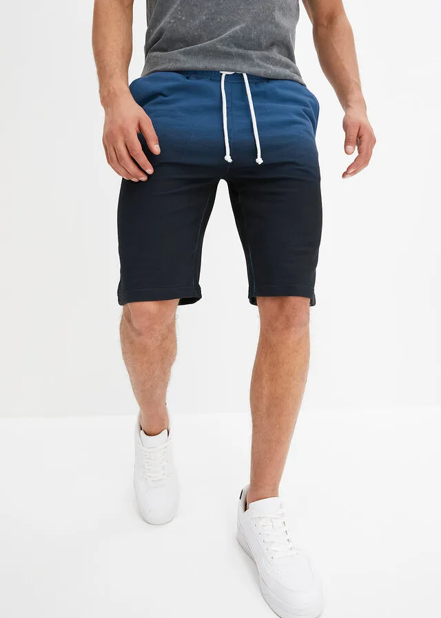 Bermudas de chándal con degradado de color Petróleo azul/negro estampado