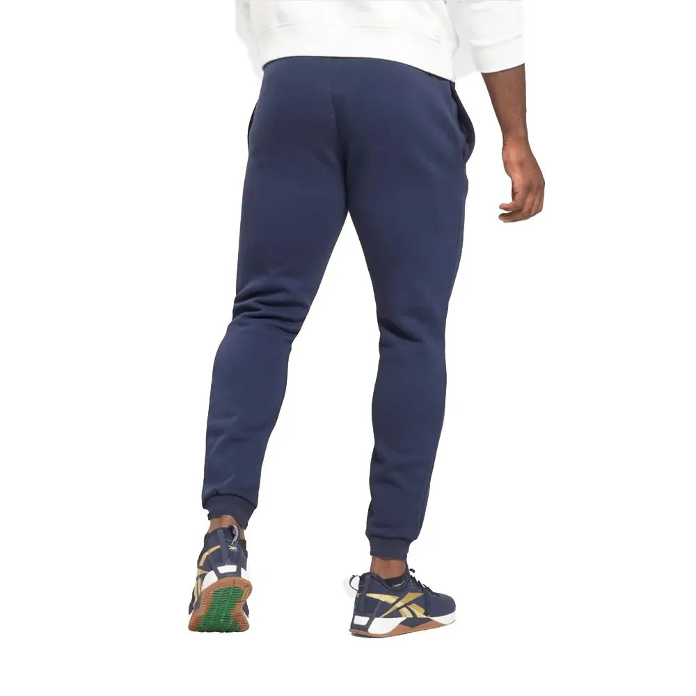 REEBOK PANTALÓN HOMBRE - RI ARCH LOGO VECTOR AZL